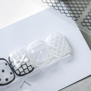5D embossed nail stickers featuring black dots, white grids, and 3D bowknot designs