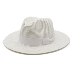 Detail of white woven straw Panama hat featuring elegant matching satin ribbon and bow