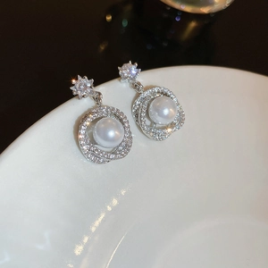Exquisite silver star stud earrings with pearl pendant and pavé diamond ring accents