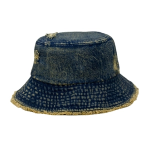 Vintage washed denim bucket hat with distressed ripped details and raw yellow fringe edges