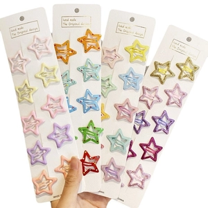 Glittering star-shaped hair clips in various colors for girls and children hair accessories