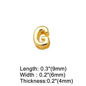 Macro shot of 9x6x4mm gold-plated letter G pendant with precise dimensions displayed