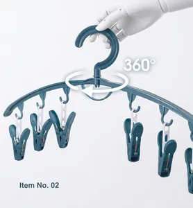 Detail of 360-degree rotating hook on a windproof clothes hanger with socks clips
