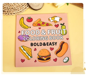 Flat lay of Food & Fruit coloring book with bold cartoon illustrations for kids