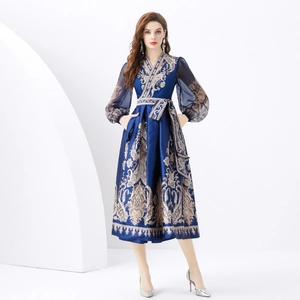 Navy blue paisley wrap dress with V-neck lantern sleeves and tie-waist detail