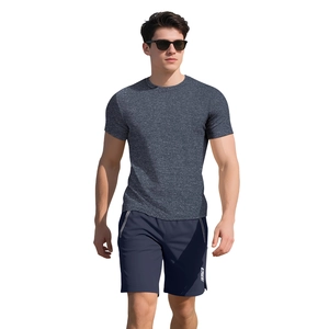 Men's heavyweight cotton Henley T-shirt with navy shorts on model in motion