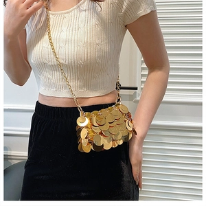 Golden sequin crossbody bag for women with round metallic discs and a fine chain strap