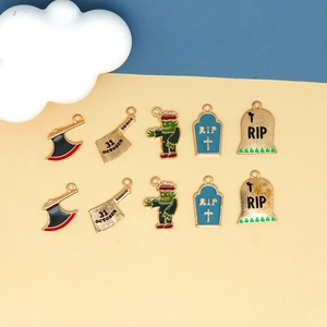 Set of 10 Halloween alloy charms featuring enamel pumpkin, skull, and RIP gravestone motifs