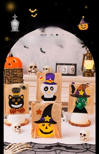 Detail of four Halloween burlap gift bags with pumpkin, witch, cat, and skull appliques