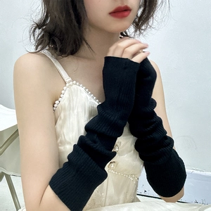 Japanese style black knitted arm sleeves with stylish slouchy folds for a hip-hop look
