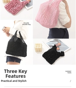 Detail of pink and black pleated bubble bags showing stretchy texture and wide handles