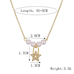 Detail view of gold star pendant with pearls showing 45+5cm length and 3.5g weight info