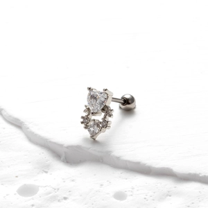Detail of silver stainless steel screw stud earring with heart and square zircon stones