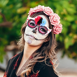 Day of the Dead eyewear set with colorful roses and skull eye mask on a model