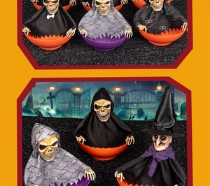 Detailed Halloween skull and witch candy bowls with glowing eyes and spooky motion