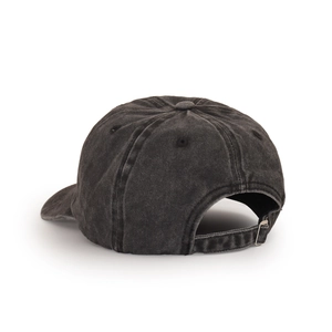 Detail view of washed cotton baseball cap with adjustable metal slider buckle at the back
