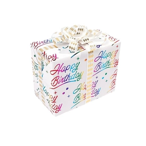 Classic white gift box with colorful Happy Birthday lettering and elegant gold-patterned ribbon