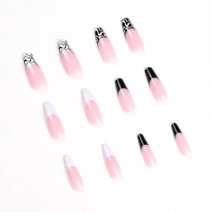 Faux ongles cercueil français avec motif de vagues noir et blanc sur base rose translucide
