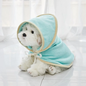 Detail of soft mint green microfiber pet bathrobe with white bow tie and hooded design