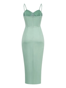 Rear view of mint green bodycon dress showing back zipper detail and sleek cut