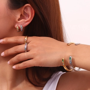 18K gold plated stainless steel jewelry set with colorful zircon stones on female model