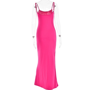 Detail view of pink backless maxi dress showing smooth stretchy fabric and slim fit design