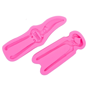 Stampi in silicone rosa a forma di attrezzi con chiave e pinza per decorazioni torte