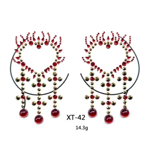 Detailed view of XT-42 red resin rhinestones for festival body and chest decoration