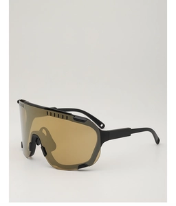 Detail view of tea-colored lenses and black matte frames on outdoor cycling sunglasses