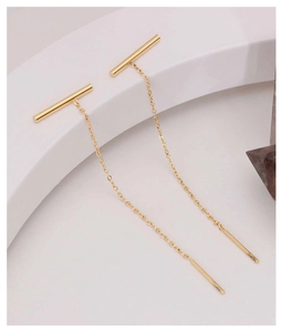 Detail view of 18k gold plated stainless steel long chain T-shaped drop earrings