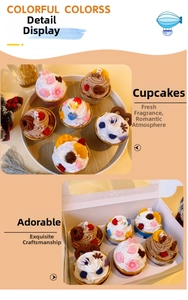 Detailed view of assorted cupcake scented soy candles in decorative gift box packaging