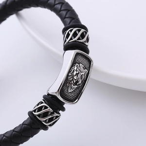 Bracciale retrò da uomo in pelle nera intrecciata con testa di leone in acciaio inossidabile