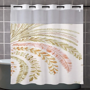 Detail of waffle weave shower curtain with feather pattern and top sheer mesh panel