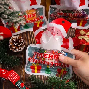 Sacchetto regalo di Babbo Natale autosigillante con caramelle colorate per le feste