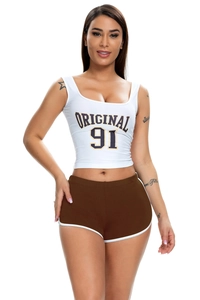 Close-up of white cropped tank top and dark brown sporty shorts with side piping detail