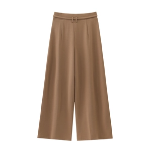 Close-up of high-waisted wide-leg trousers in brown with a premium draped fabric texture