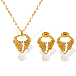 Elegant gold hollow angel wing jewelry set with white pearls necklace and earrings