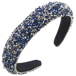 Detail shot of the wide rhinestone headband featuring royal blue and silver crystals
