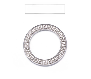 Macro shot of silver titanium ring with Greek meander pattern for DIY jewelry design