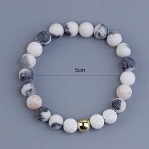 Pink zebra stone beads and golden metal bead bracelet with 5cm inner diameter size