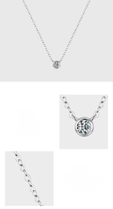 Macro detail of S925 sterling silver chain with a bubble-set sparkling zircon pendant