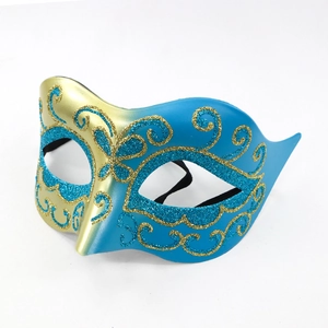 Blue and gold masquerade mask with glitter swirls for carnival and party events