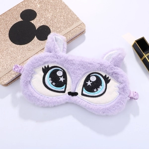 Cute purple plush cartoon eye mask with big eyes and cat ears on white desk backdrop