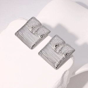 Irregular vintage 18k gold plated stainless steel square earrings on white stone