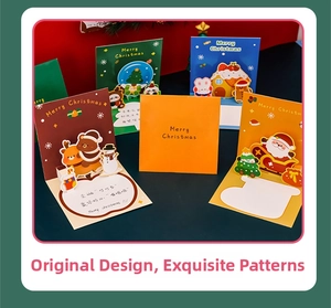 Detailed view of assorted 3D pop-up Christmas greeting cards with reindeer and Santa designs
