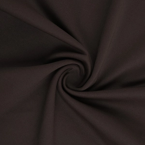 Vue macro d'un tissu marron foncé à armure toile avec des plis de drapé élégants