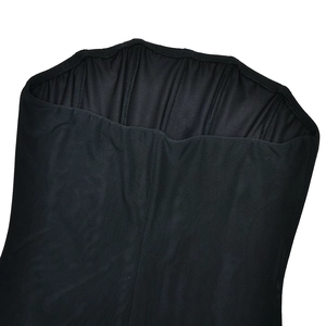 Close-up of the elastic fabric texture and off-shoulder neckline on a black mini dress