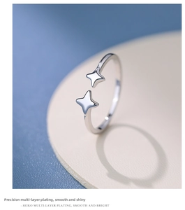 Detail of S925 sterling silver four-point star ring with multilayer electroplating finish
