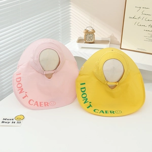 Kids summer sun visor hat with wide brim in pink and yellow featuring bear logo