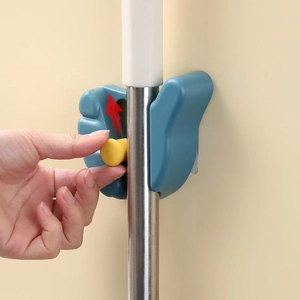 Adjustable wall-mounted mop holder with hook and sturdy adhesive grip in Morandi blue color